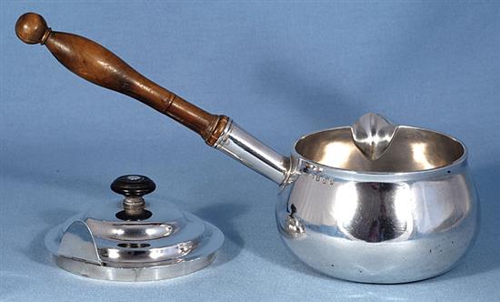 A George III Irish silver brandy pan and cover, by James Le Bass, length 310mm, gross weight 18.8oz/585grms.